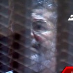 معزول صدر مرسی کو پنجرا نما جیل میں عدالت پیش کیا گیا